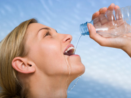 Woman drinking healthy water