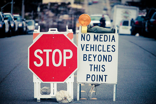 Stop sign and no media sign